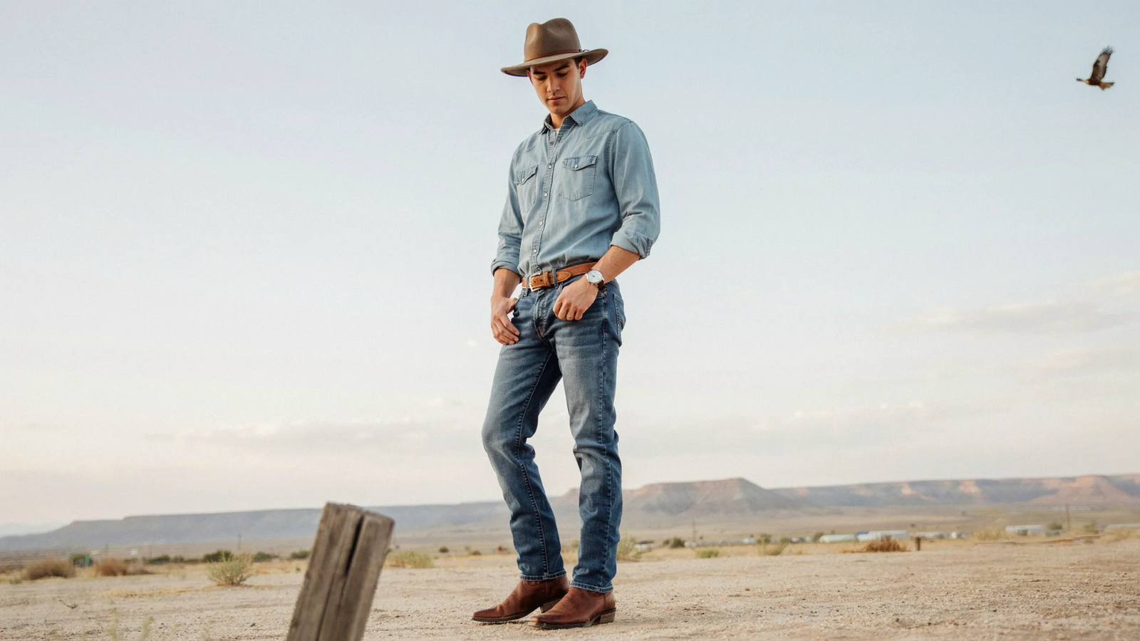 Cowboy outfit with simple and balanced Western accessories.