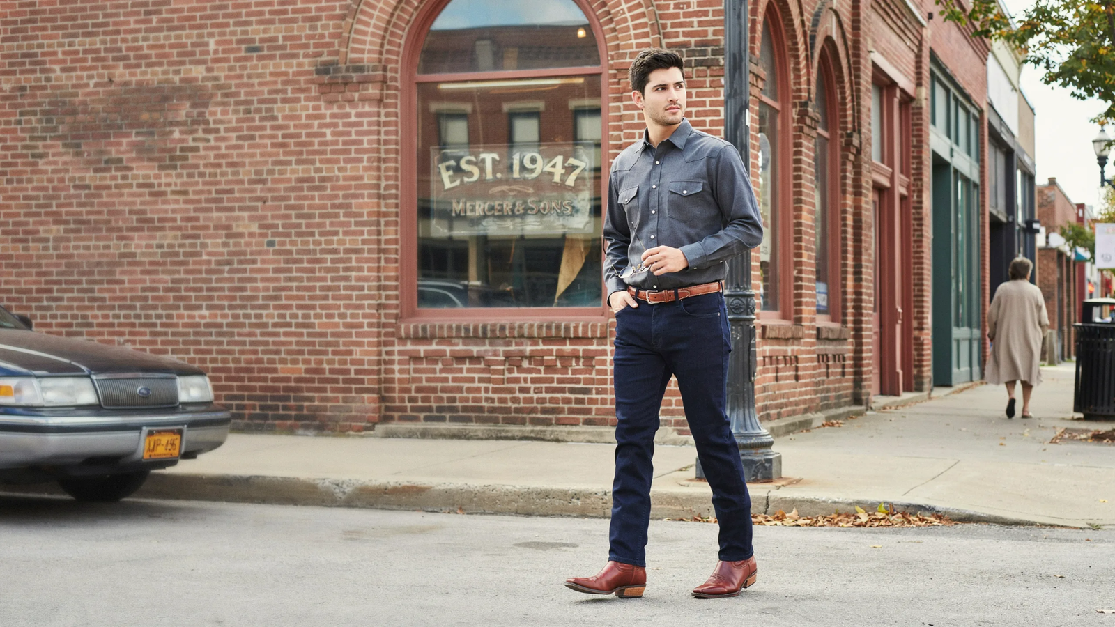 Smart-casual Western outfit with boots and a Western-style shirt.