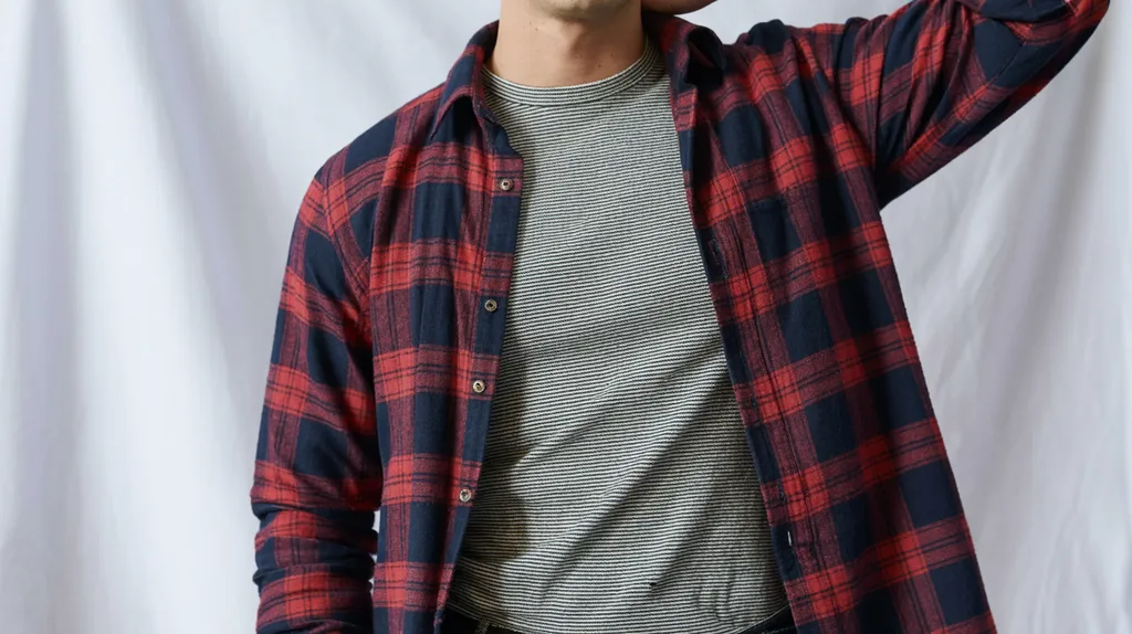 Plaid flannel combined with a striped top.