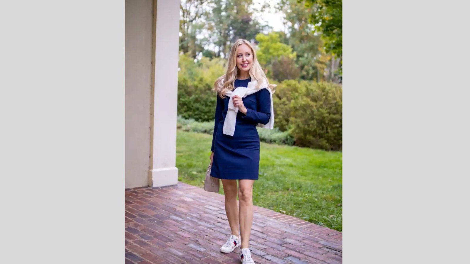 Denim shoes paired with a navy dress for a tonal outfit.