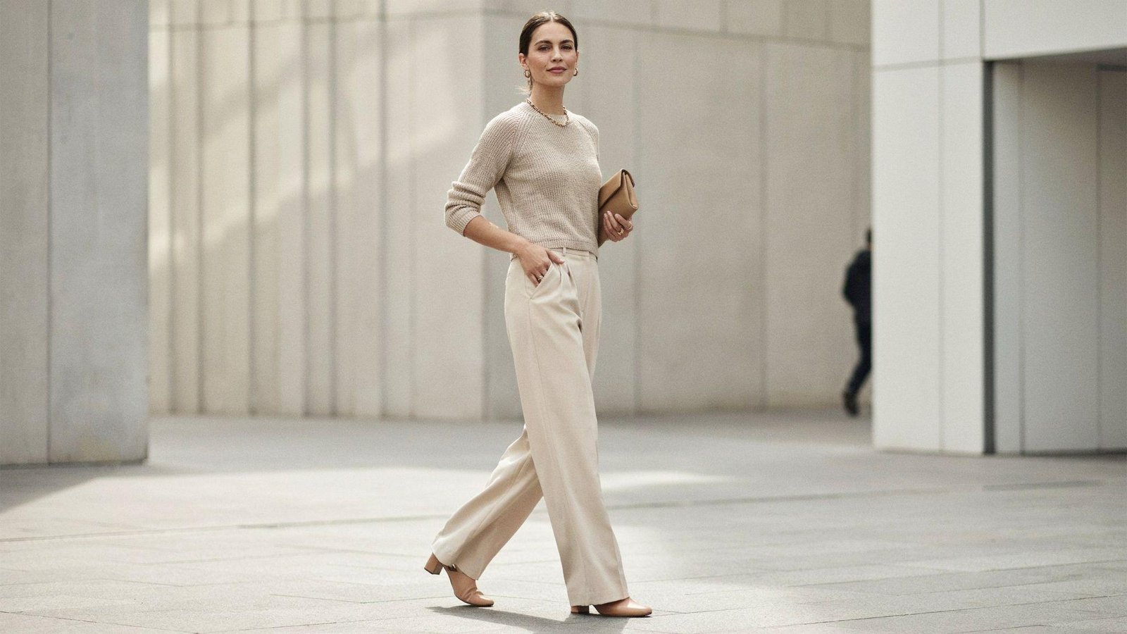"Woman wearing a monochrome wide leg pants outfit in neutral tones for a polished casual look"