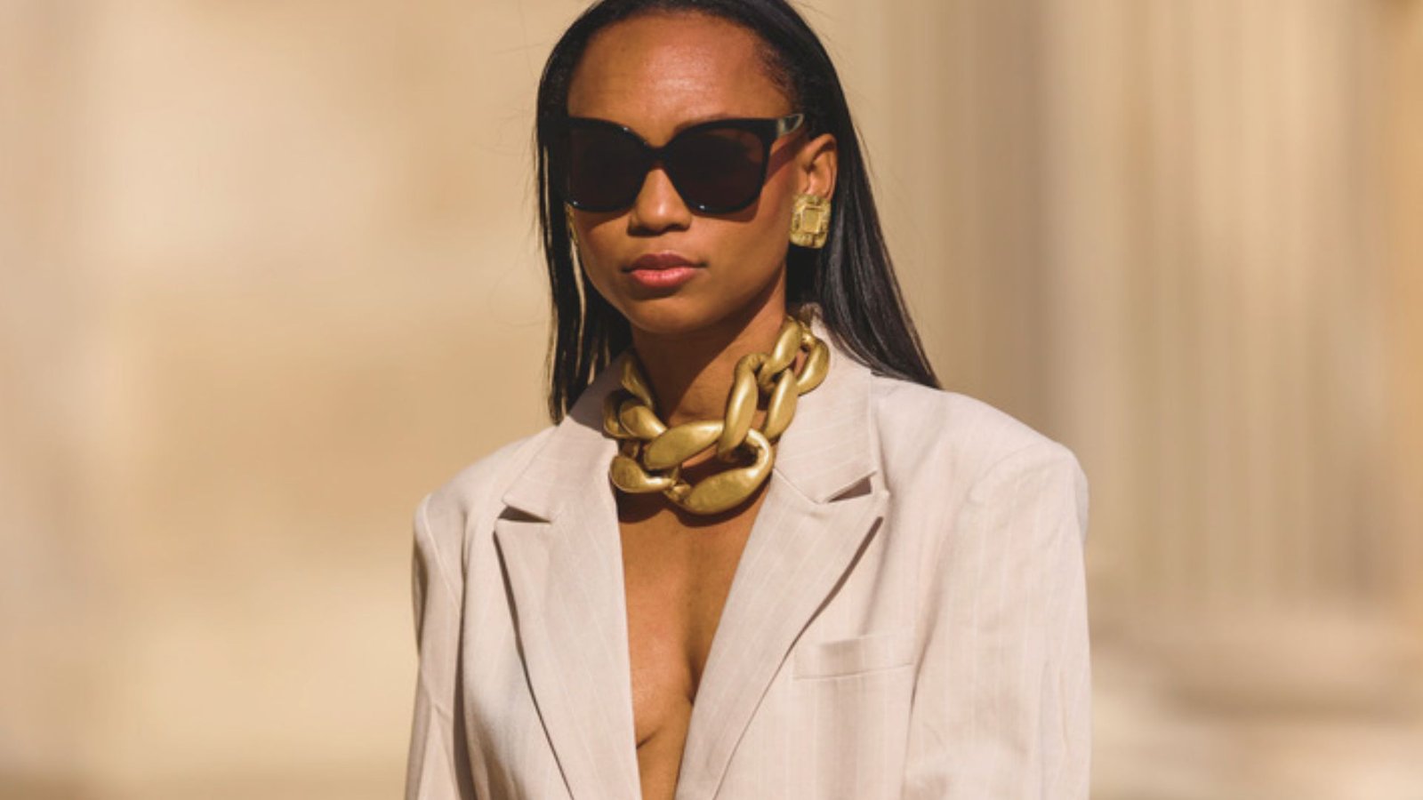statement necklace styled with a V-neck top